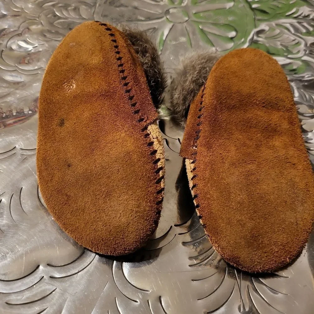 Moccasins,  real leather and real rabbit fur,  has a great insole! Size 8 child